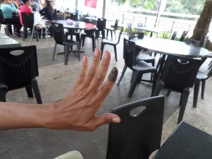 Ali's hand dipped into ink on election day in Malaysia